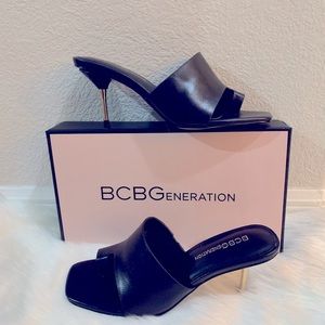 BCBGeneration Genuine black leather gold heeled sandal size 6.5